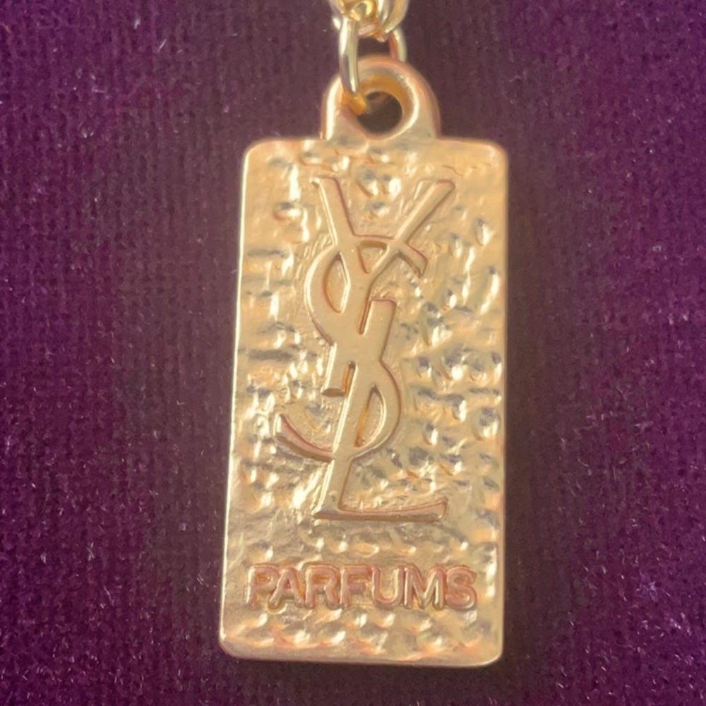 Gold purse charm